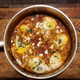 Image for article titled How to make shakshuka, the Moroccan stew that says “put an egg on it!”